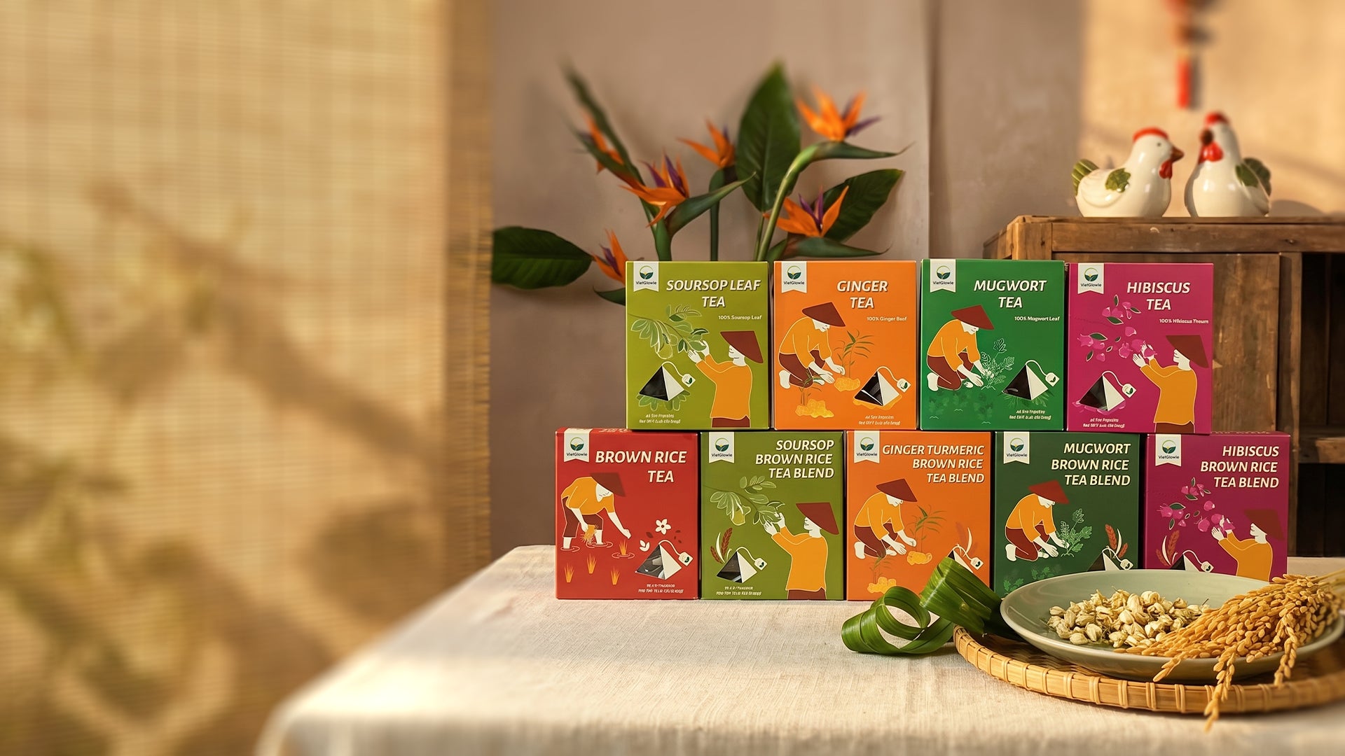 Assorted tea boxes on a table with decorative elements